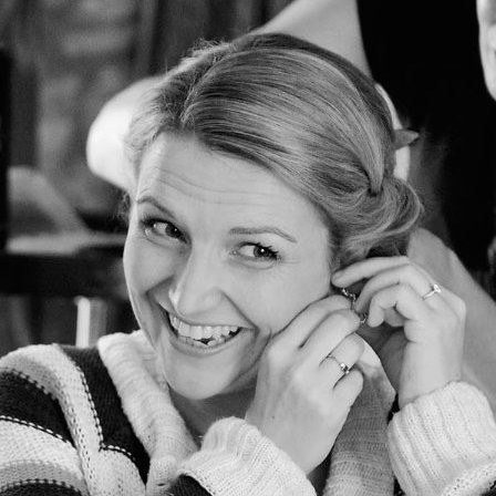 a headshot of Kim smiling